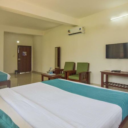 Capital O 14144 Hotel Moriz Madikeri Luaran gambar